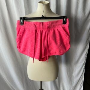 Under Armour Pink Athletic Running Shorts – Medium (Loose Fit)